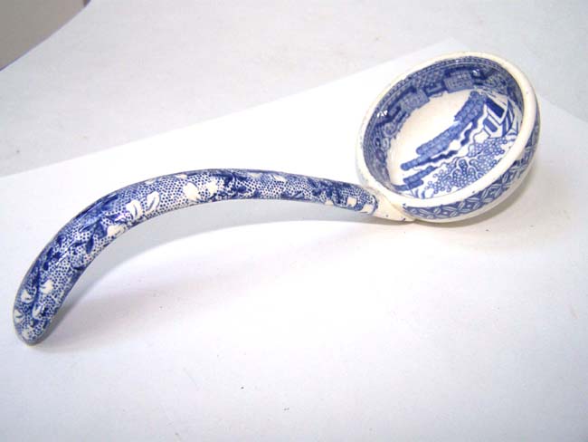 A fine small 'Blue Willow' Pattern Porcelain Ladle circa 1830